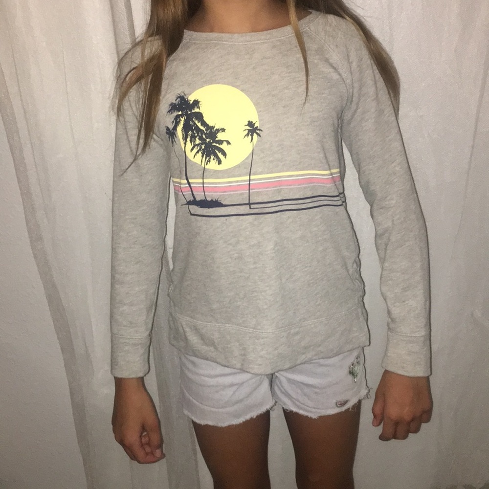 Grey sweater with light blue jeans